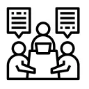 Three people sat at a meeting table with two chat bubbles 