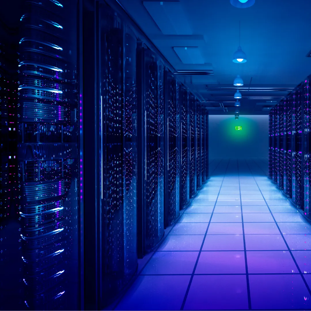 A neon blue coloured large server room