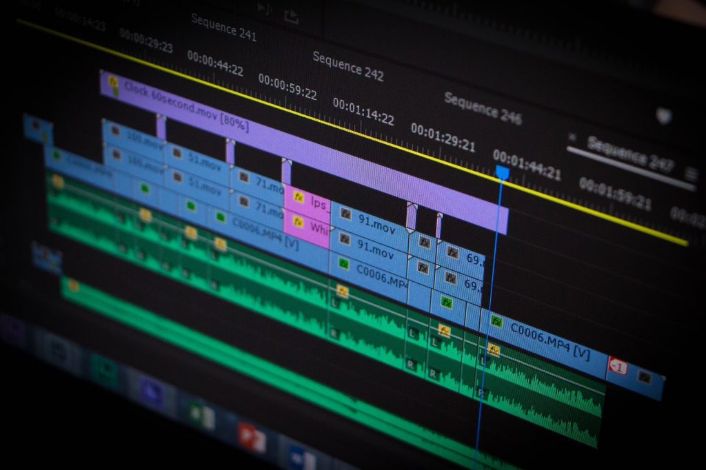 Close-up of a video editing timeline showing multiple video and audio tracks with effects applied in a software interface