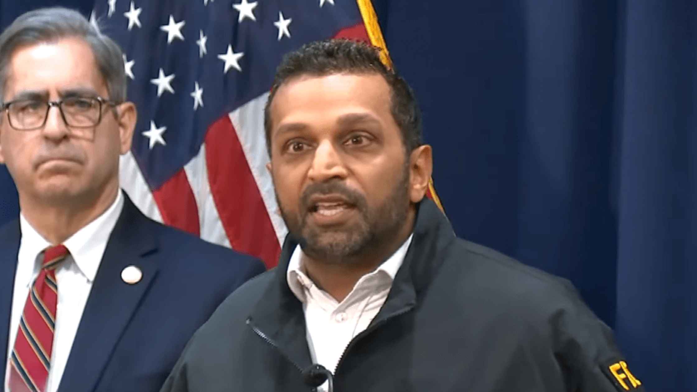 Kash Patel speaks to the press. 