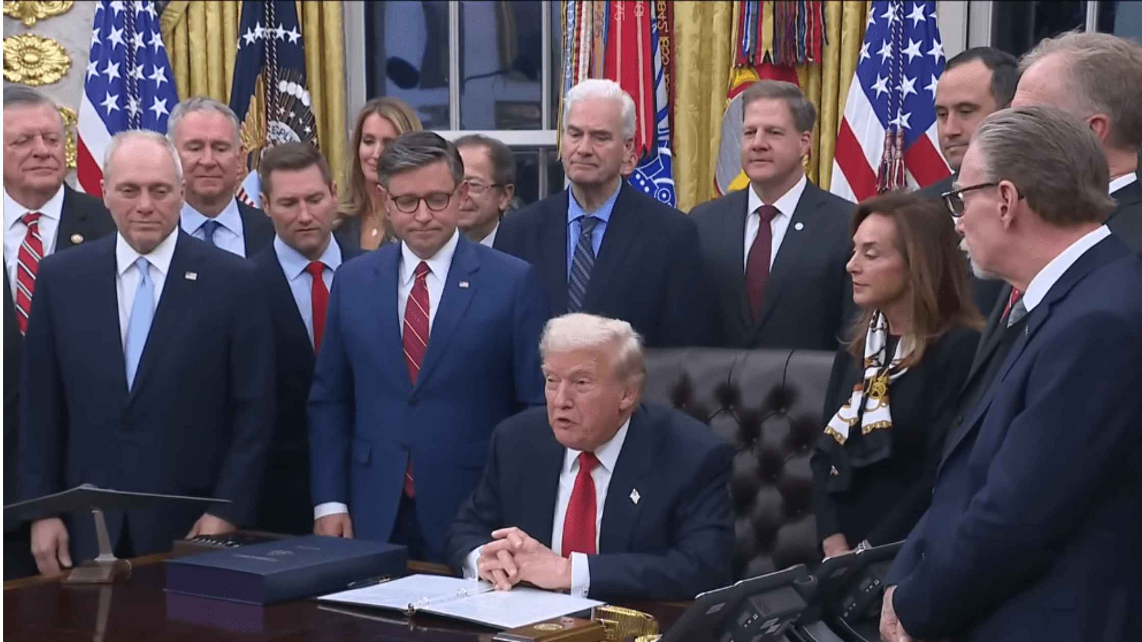 Trump speaks to press. 