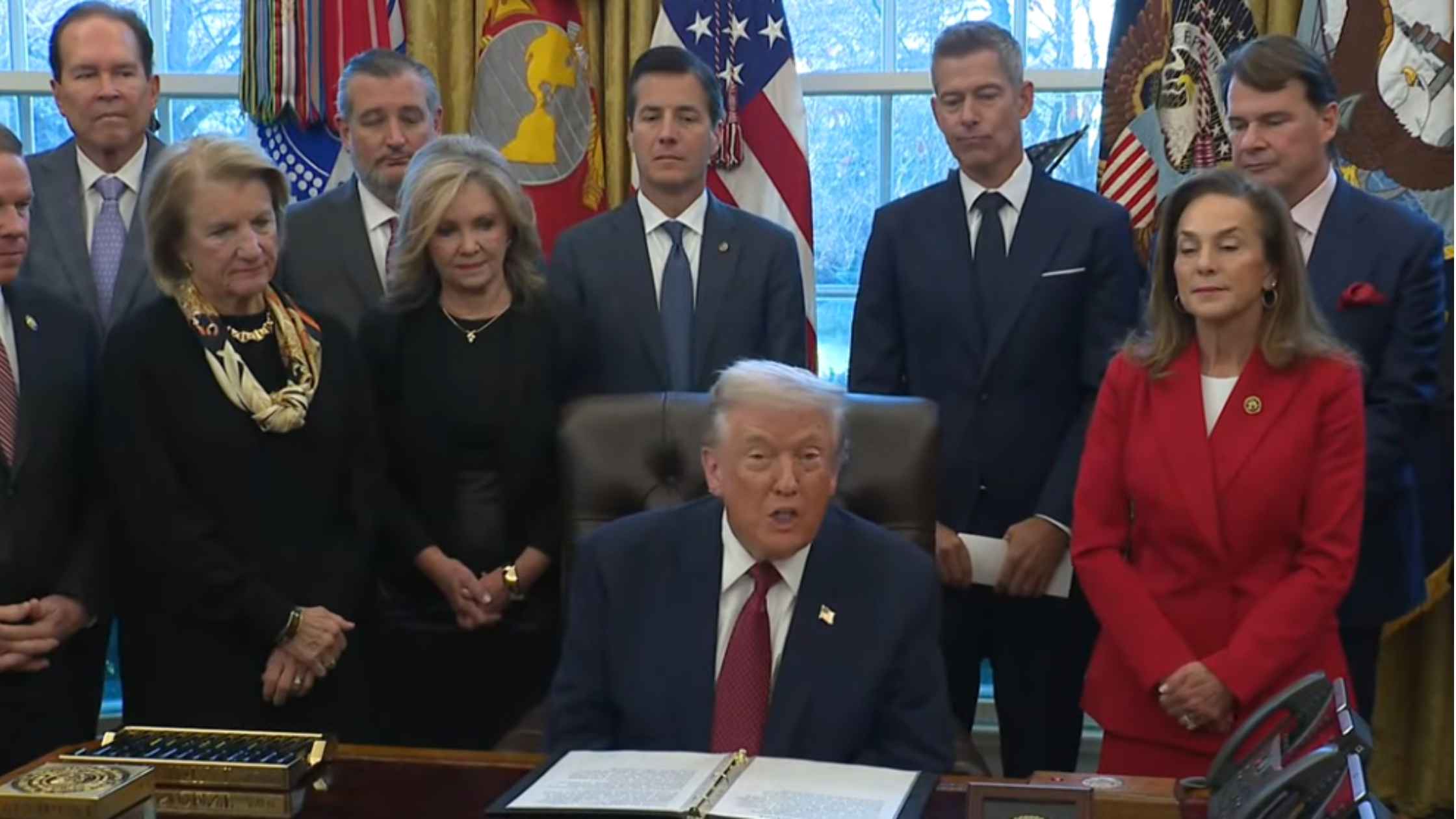 Donald rump speaks to press. 