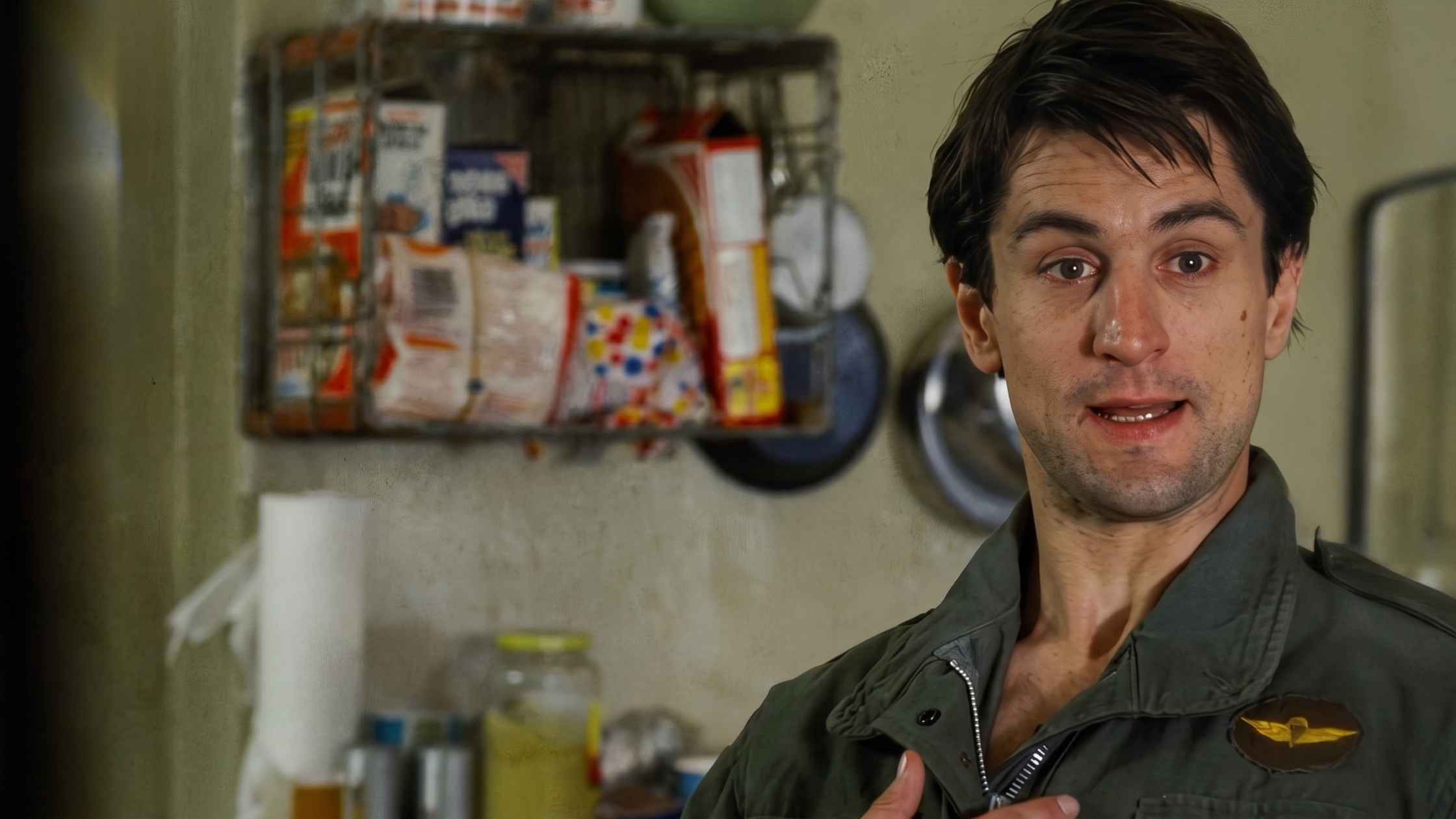 Robert De Niro's Travis Bickle rehearses a confrontation in his mirror.