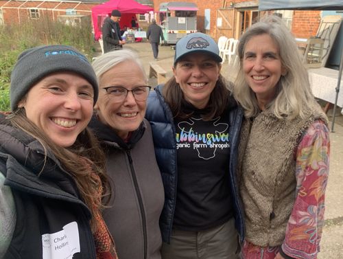 Charlotte at Babbinswood Farm. Photo left to right: Charlotte, Casha Bevan-Jones and Barbara Jones (farmers at Babbinswood Farm), Jenny Rouquette (Shropshire Good Food Partnership)