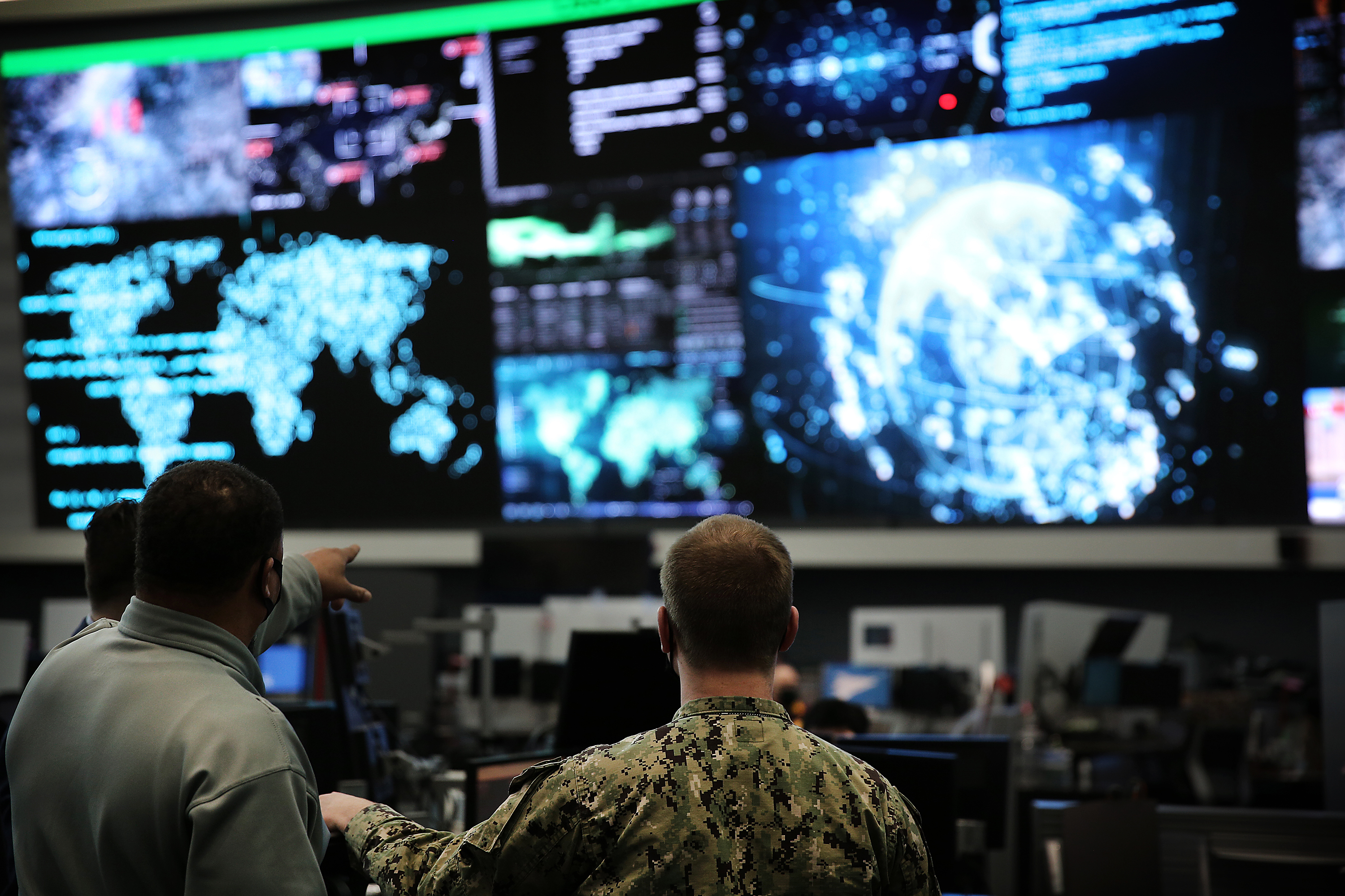 U.S. Cyber Command members work in the Integrated Cyber Center, Joint Operations Center at Fort George G. Meade, Md., April. 2, 2021.
