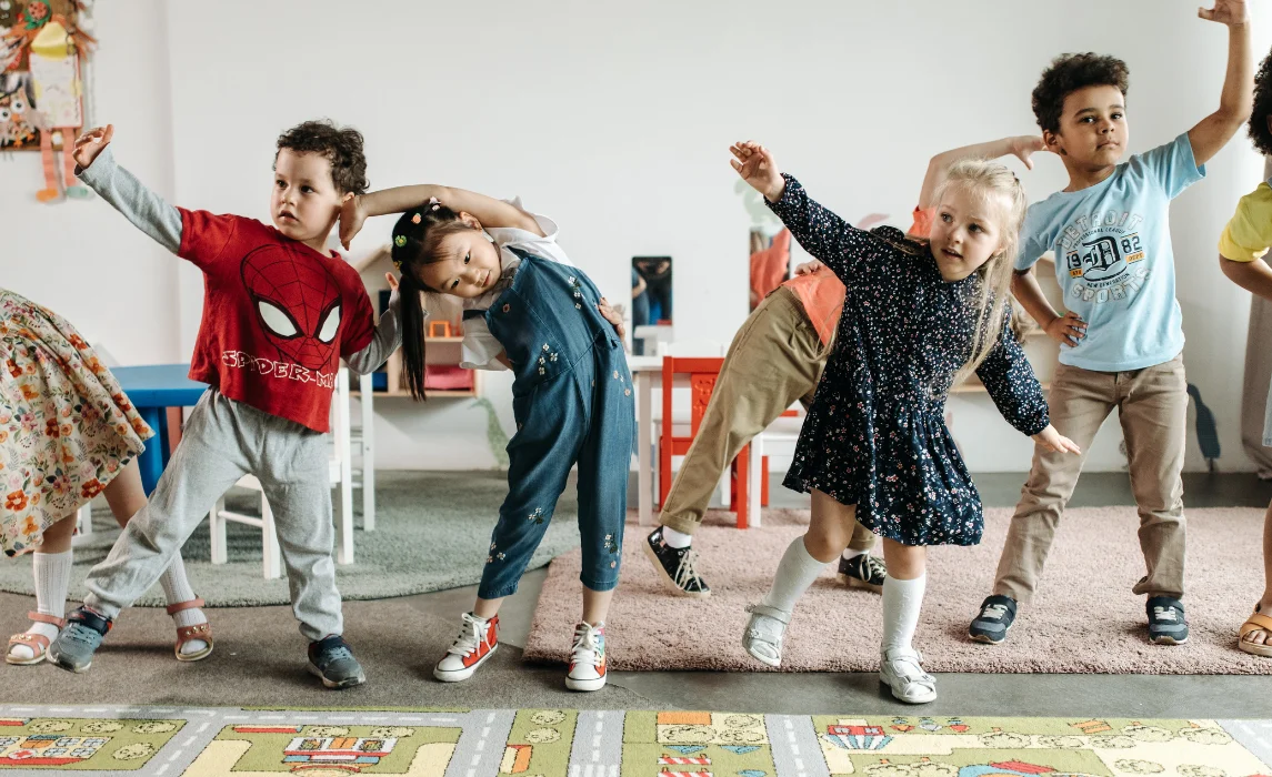 kids dancing with patterns on the floor