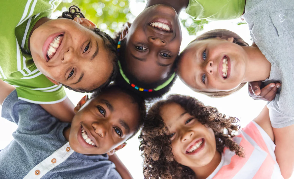 five kids looking under
