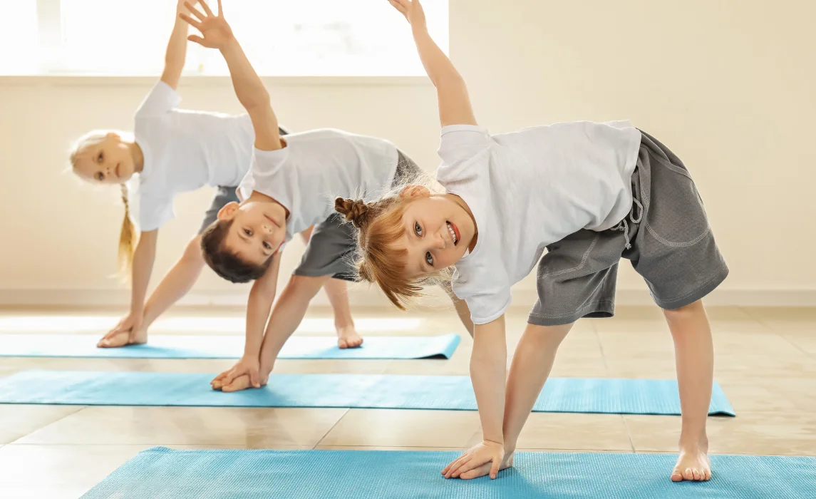 kids doing yoga inside the house