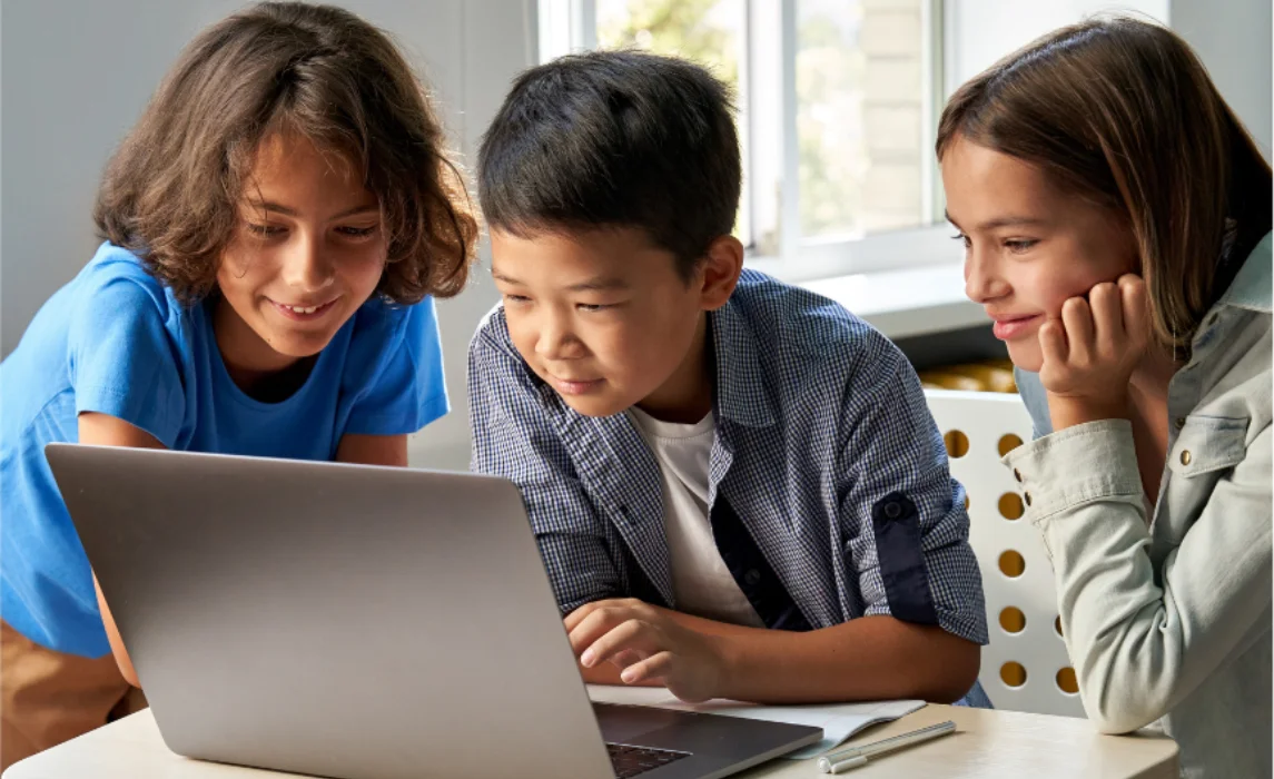 kid playing in the laptop