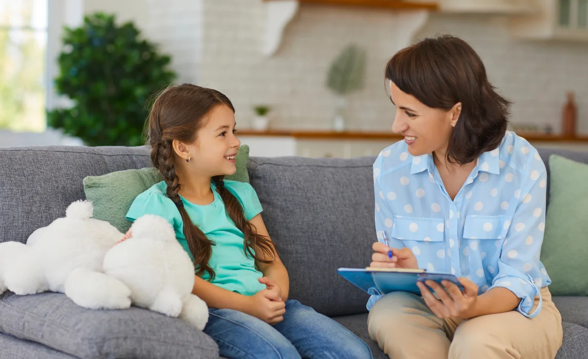 kid with here therapist