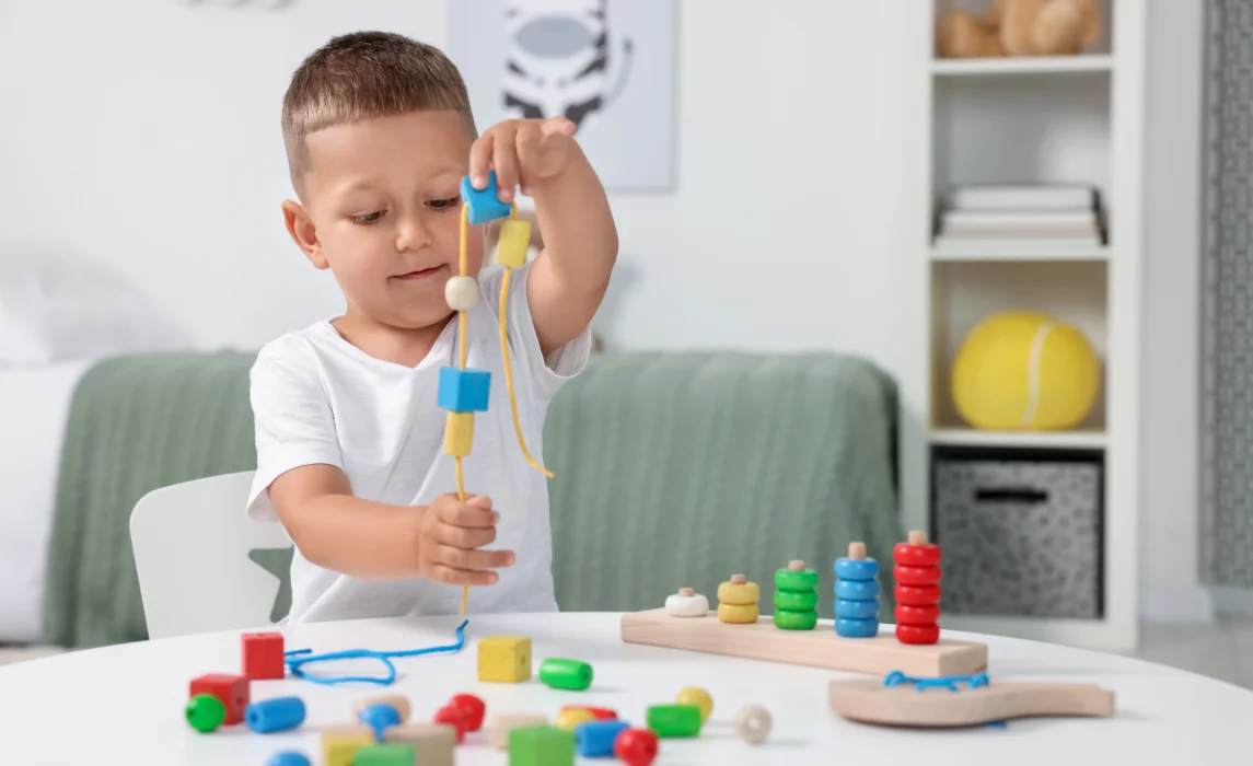 kid playing with blocks