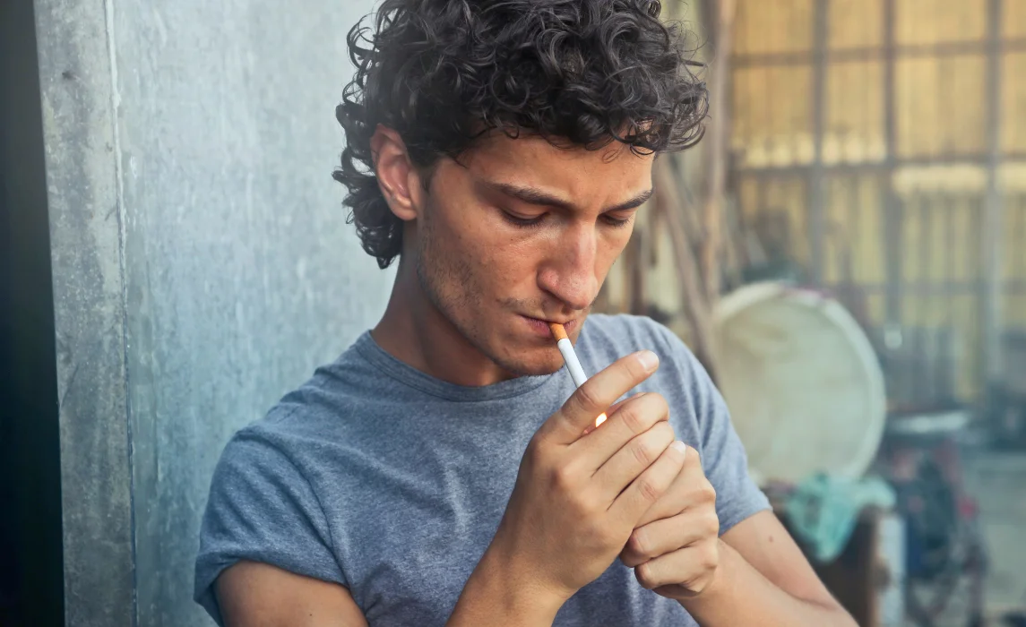 guy smoking outside