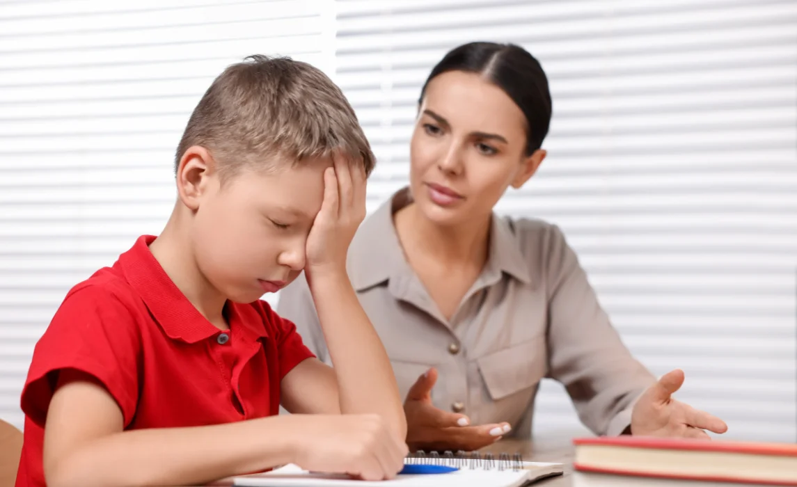 kid trying to learn writing