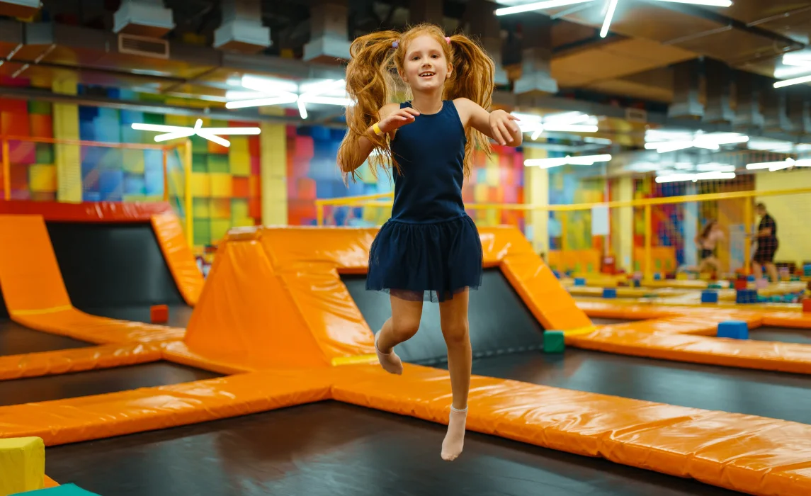 girl jumping on a trampoline