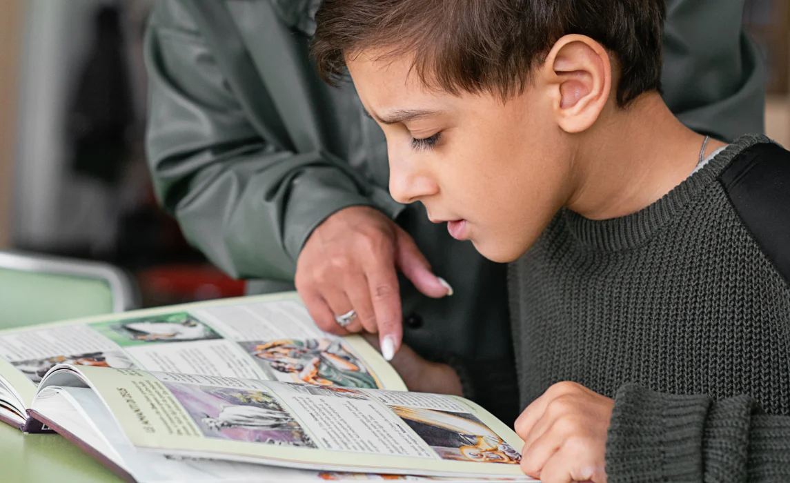 kid reading a magazine