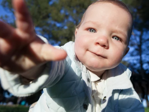 Why Does My Baby Grab My Face? 7 Common Reasons and What It Really Means