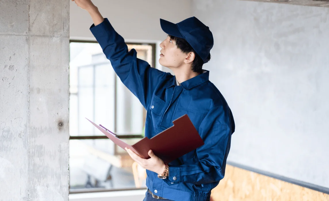 man checking indoor space