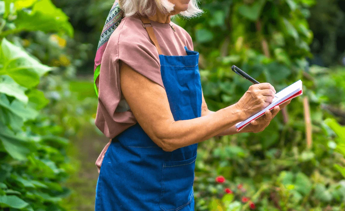 woman planning in a garden