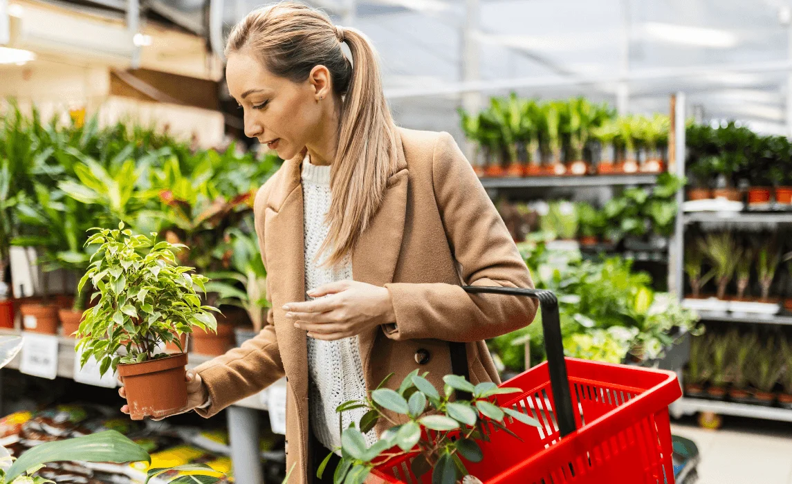 woman buying plants