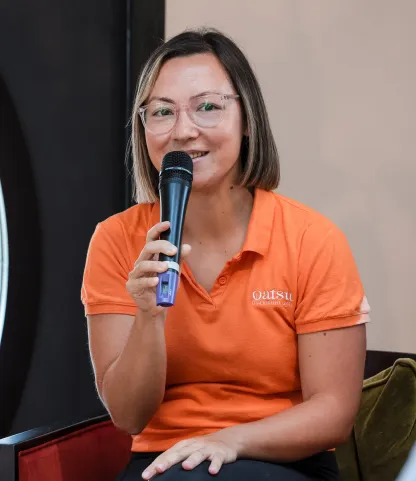 woman holding microphone