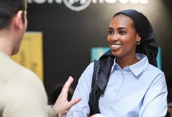 woman networking and smiling