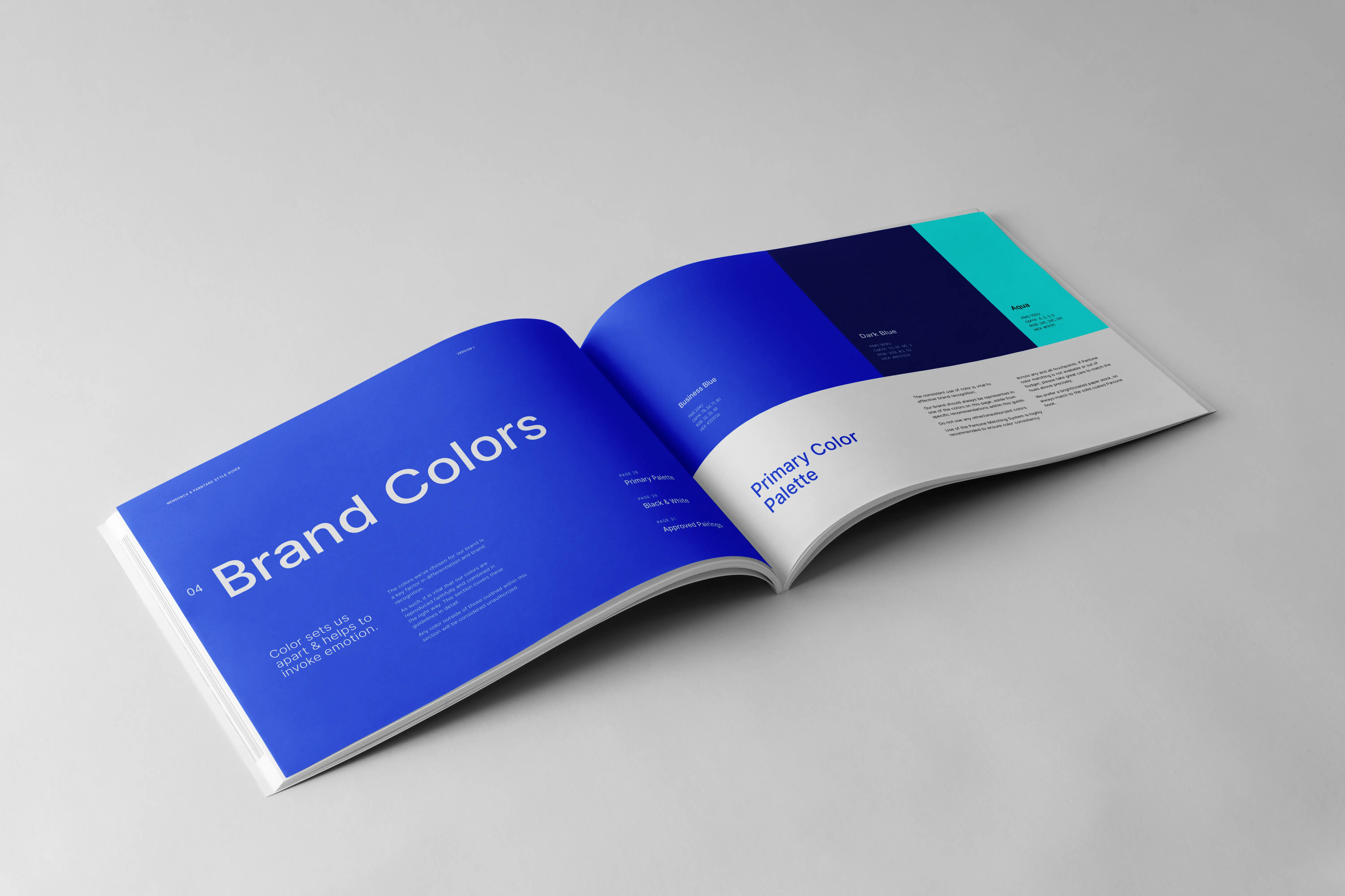Open brand guide displaying "Brand Colors" section with primary palette featuring blue, dark blue, and aqua shades.