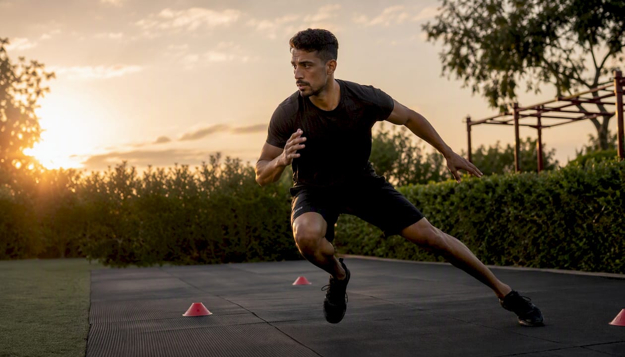 Athlete doing single-leg lateral bound drill in gym