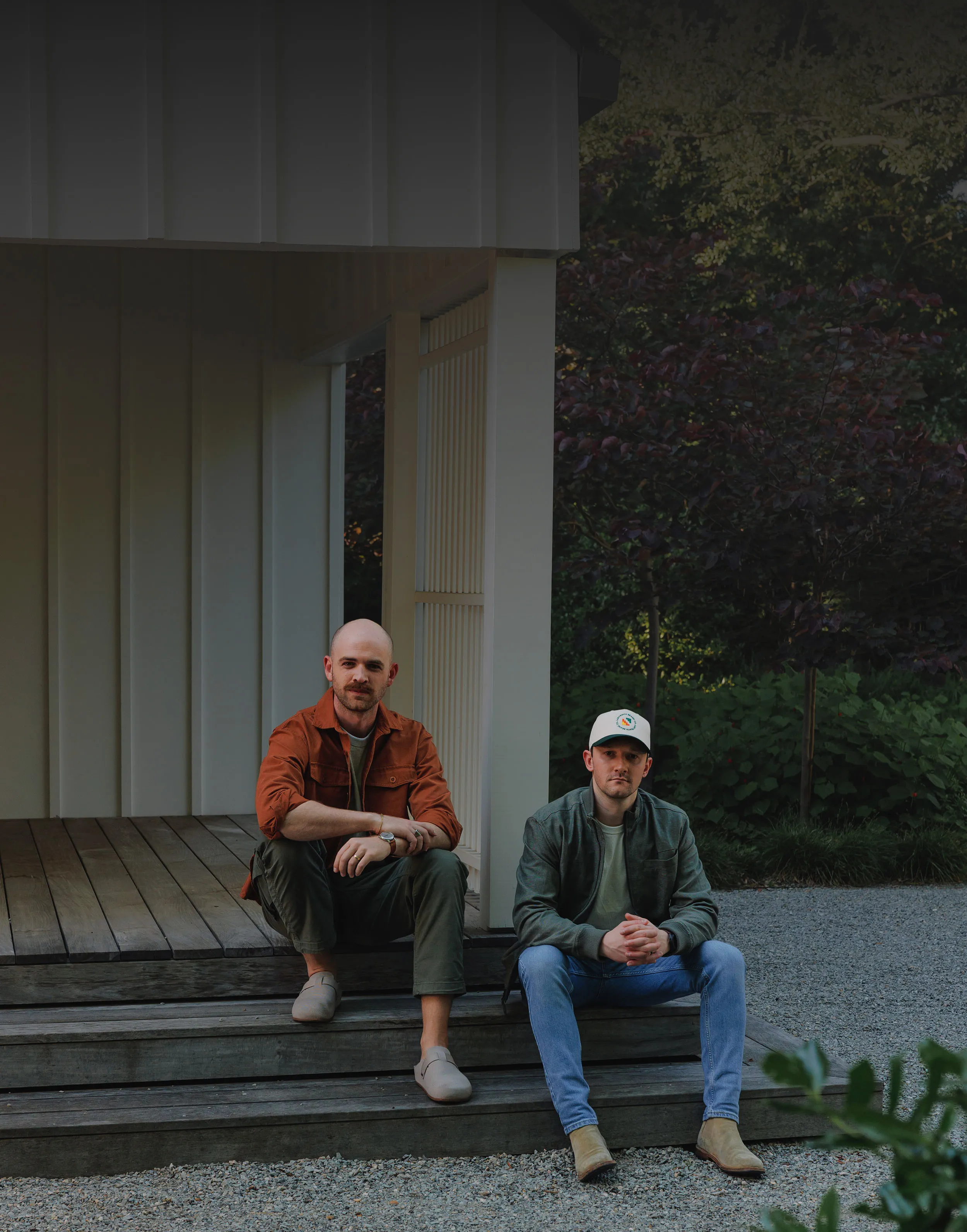 Keeton Storts and Paul Tellefsen, founders of Labyrinth Brand Co, seated outside during a company portrait session