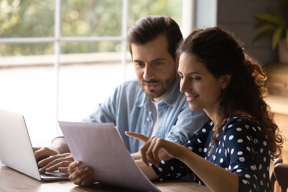Couple deciding whether to lease or buy a car
