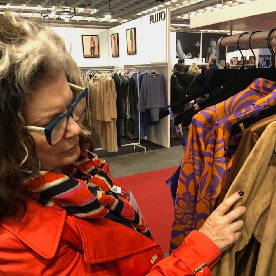 Jenette browsing through racks