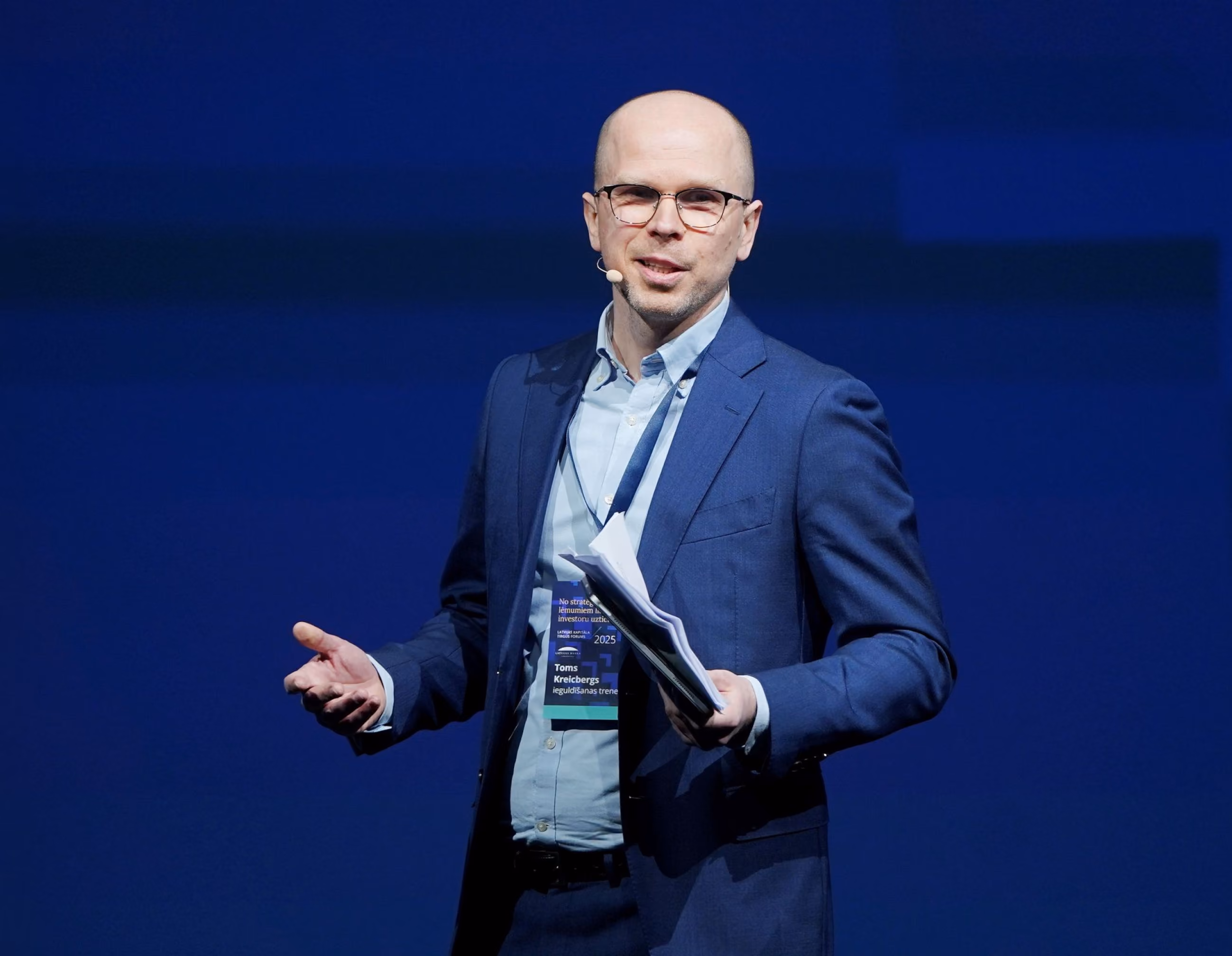 Tom Crosshill speaking on stage