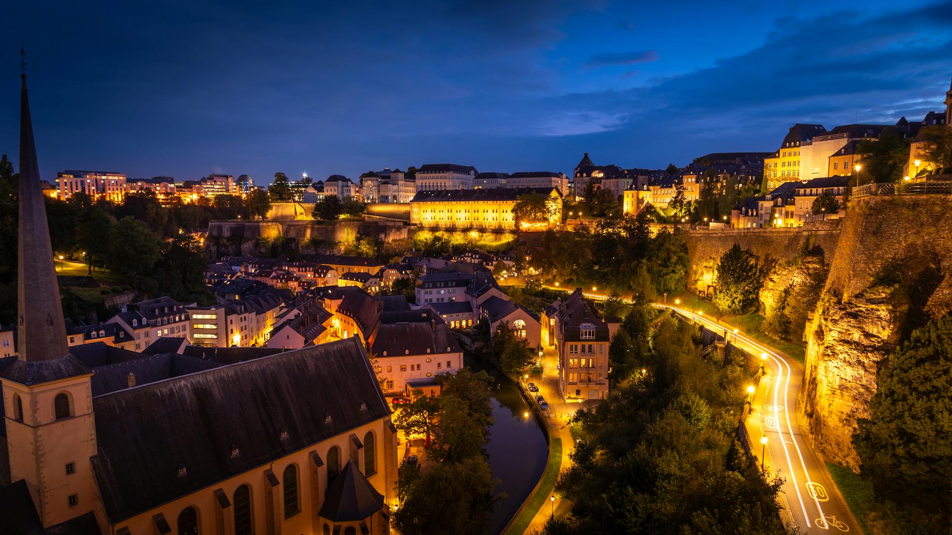 Discover the enchanting city lights of Luxembourg captured in a blue hour cityscape.
