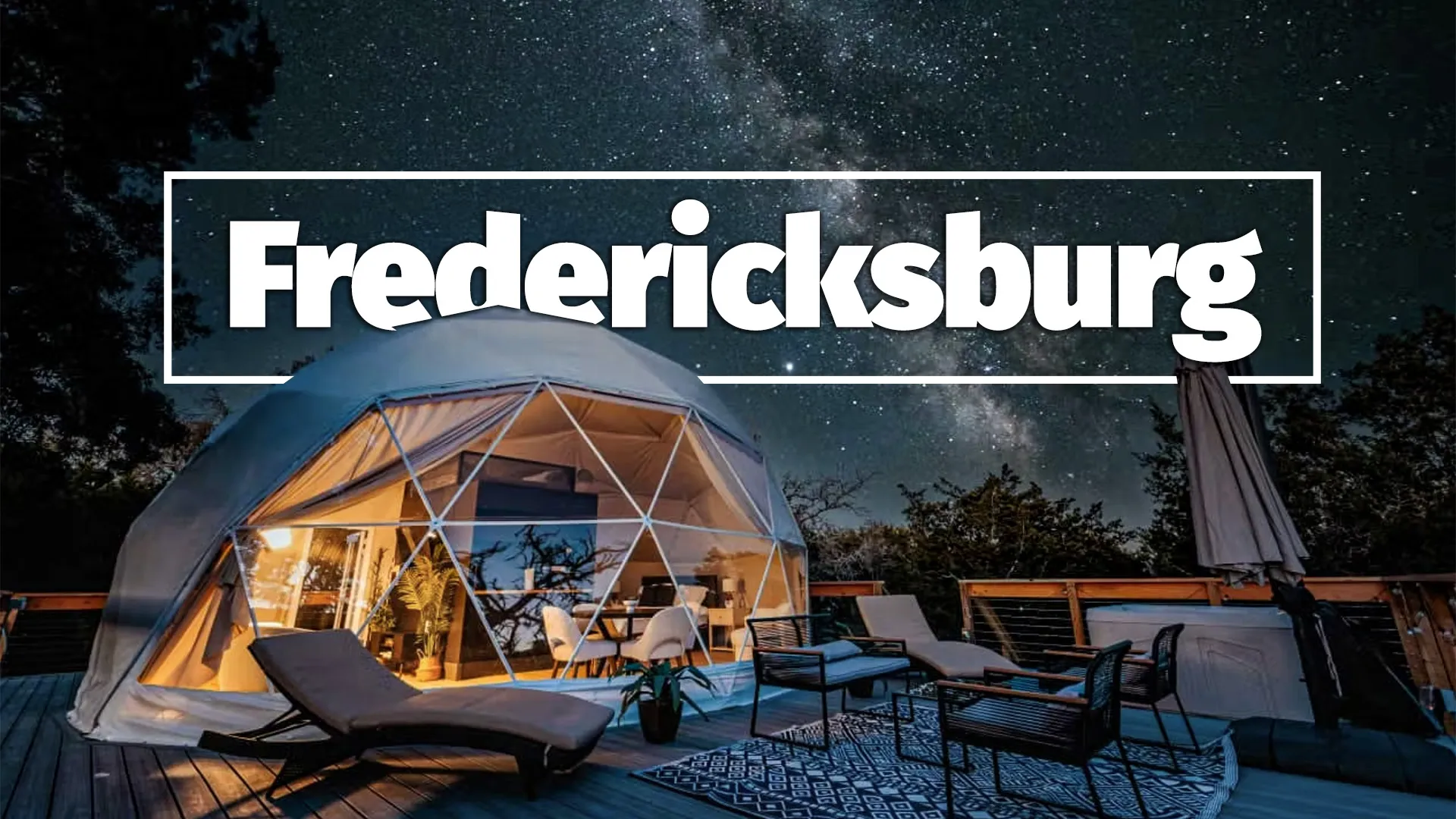 Illuminated geodesic dome glamping tent under starry night sky in Fredericksburg