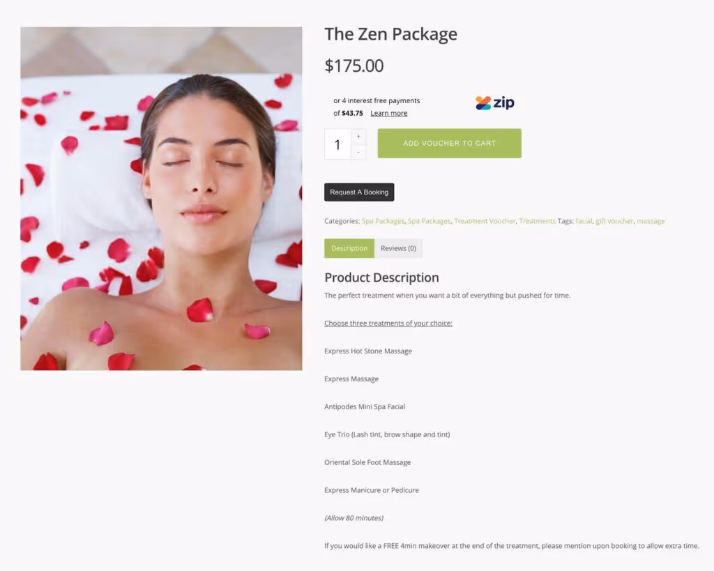 Woman with closed eyes relaxing on spa bed with rose petals on her chest and around her head.