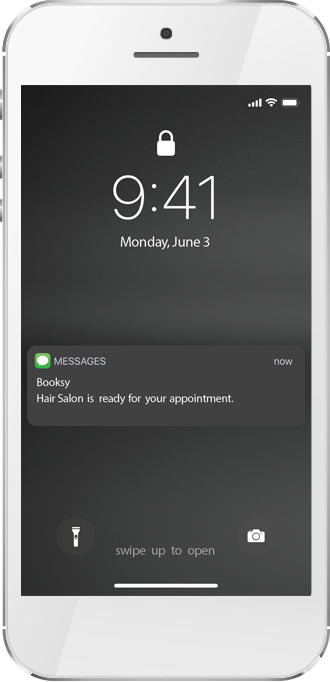 Phone lock screen showing Hair Salon appointment ready notification from Booksy at 9:41 on June 3.