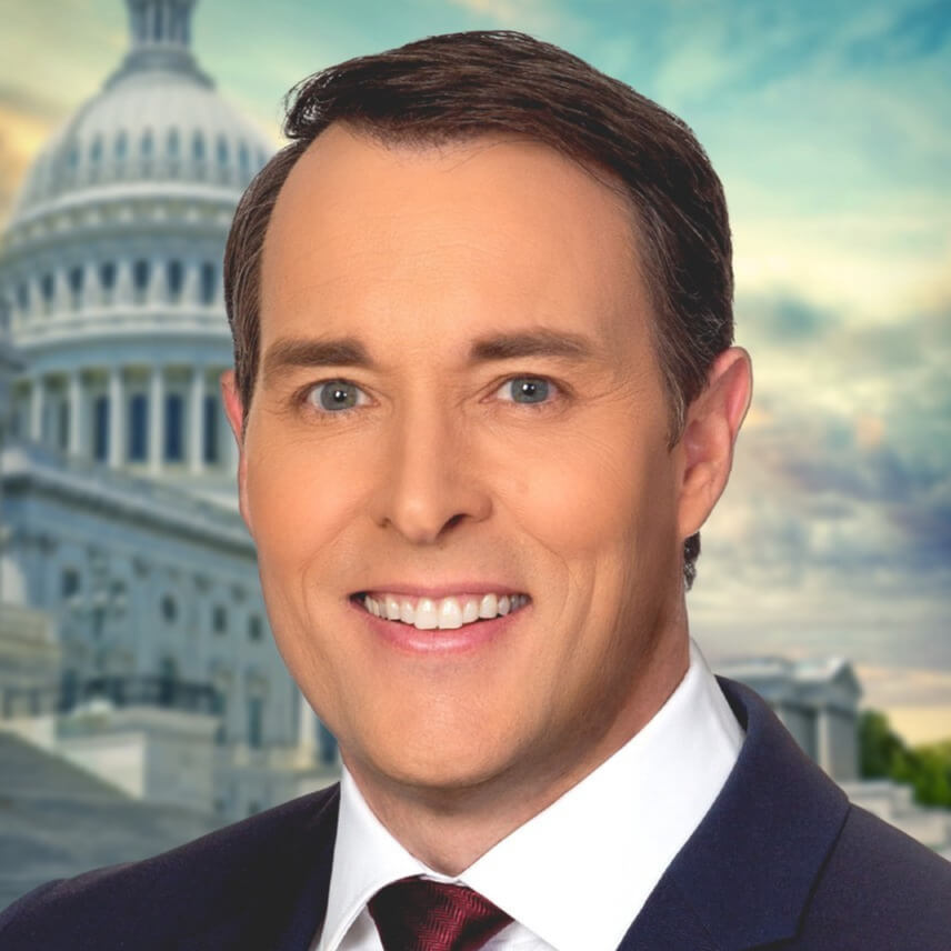 Headshot of Scott Thuman, ABC-7 News, in suit and tie with the U.S. Capitol blurred in the background.