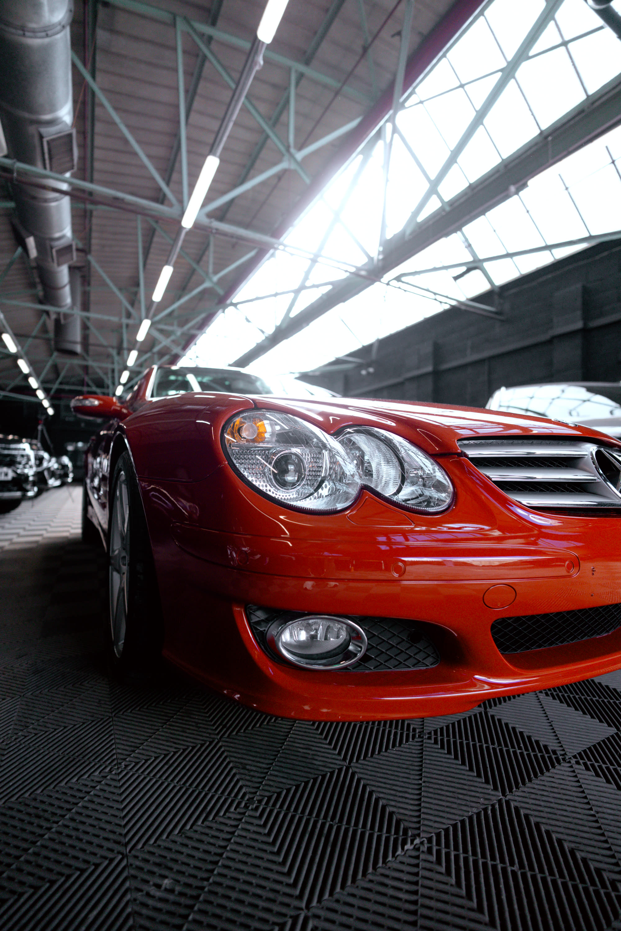 Red Mercedes SL photographed in the TCC Luxe showroom