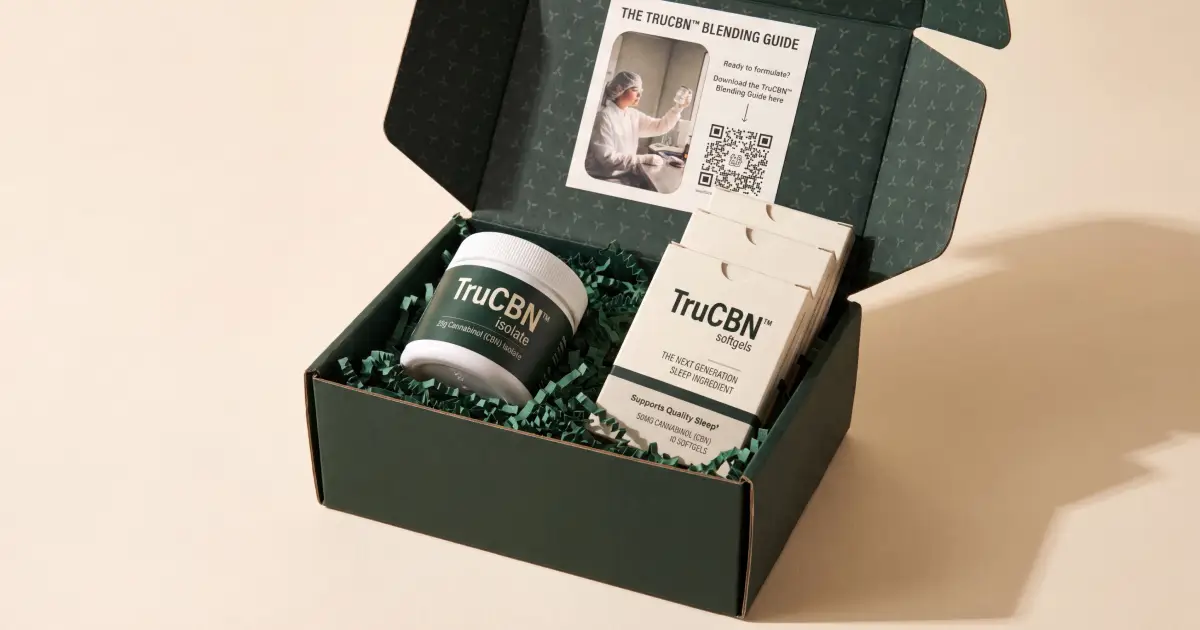Open box with TruCBN isolate jar, softgels, and blending guide