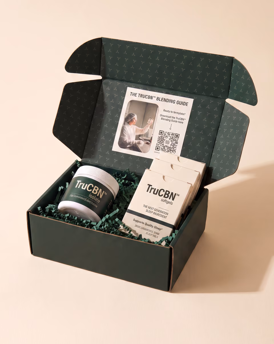 Open box with TruCBN isolate jar, softgels, and blending guide