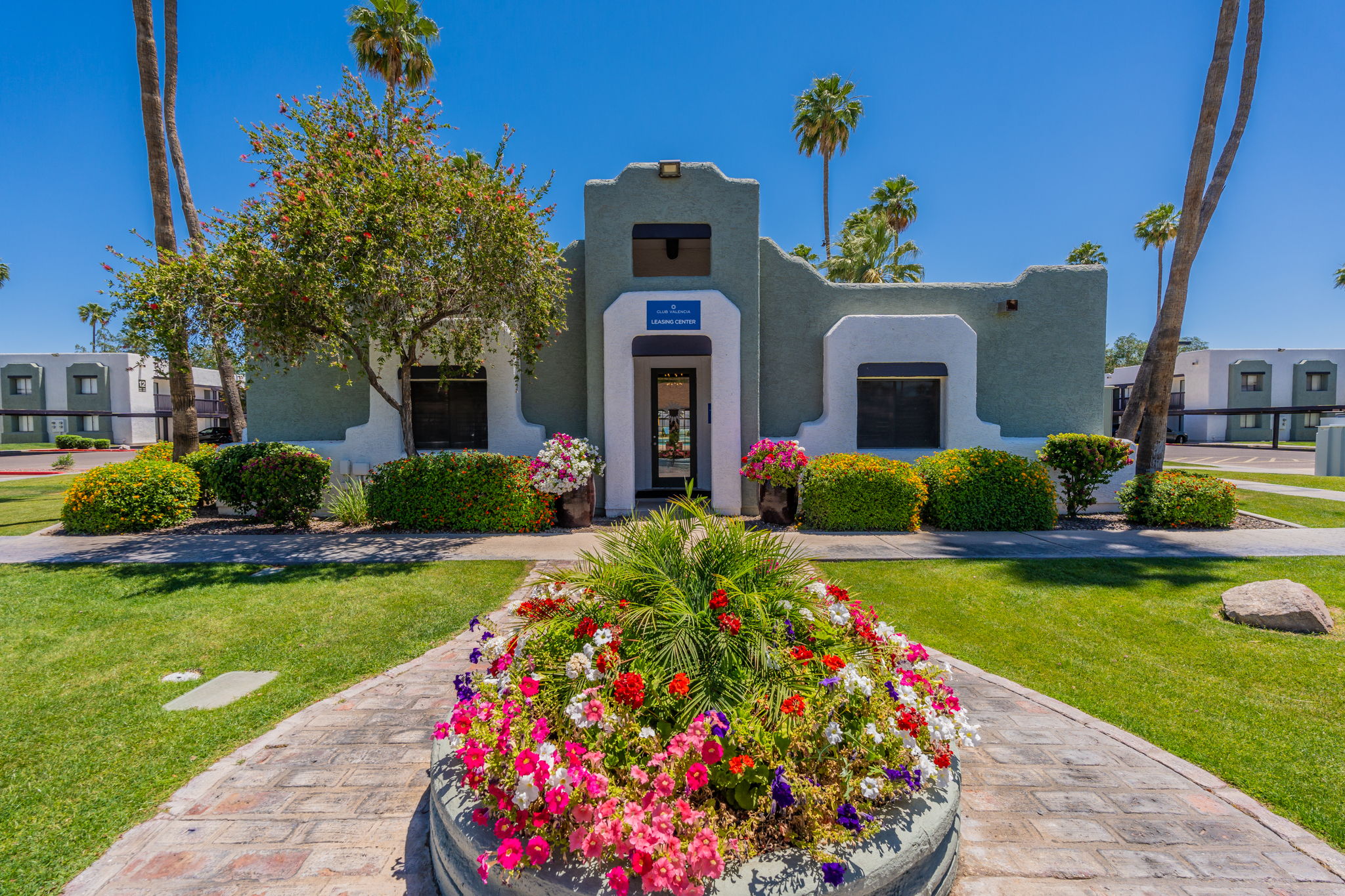 Landscaped clubhouse entrance.