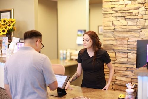 Michaela welcoming patient