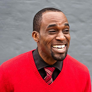 Picture of Public Servant Victor Udoewa in Red Sweater..