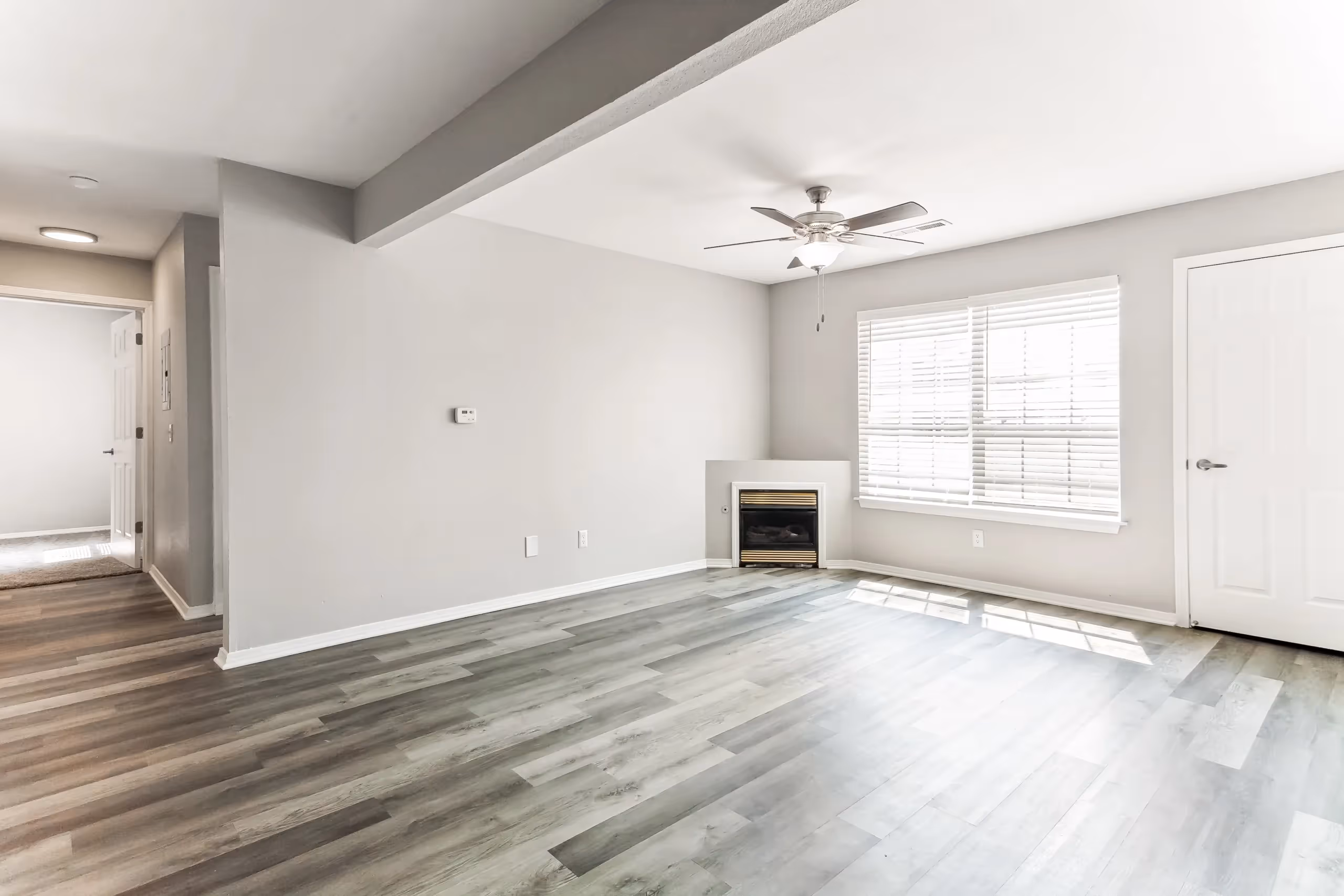 Empty living room with fireplace