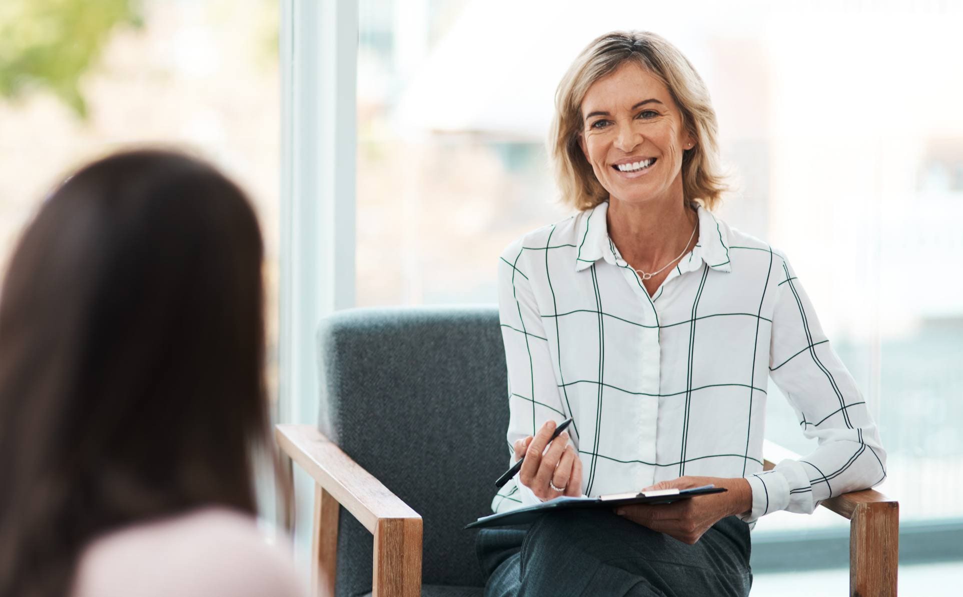 Therapist supporting client at Manayunk rehab.