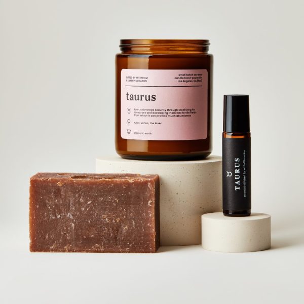 image of Taurus intention-setting candle, Taurus essential oil, and Taurus soap