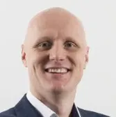 A headshot of Reinhardt Smit.
