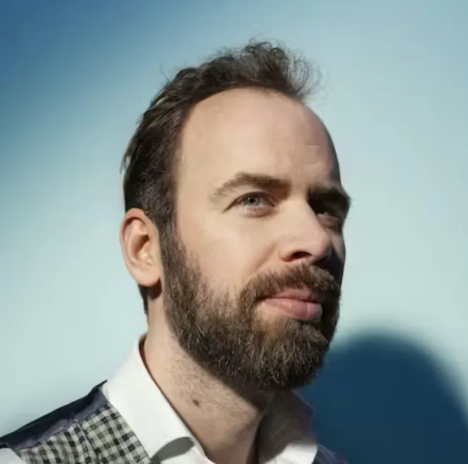 A headshot of Jeroen den Bok.
