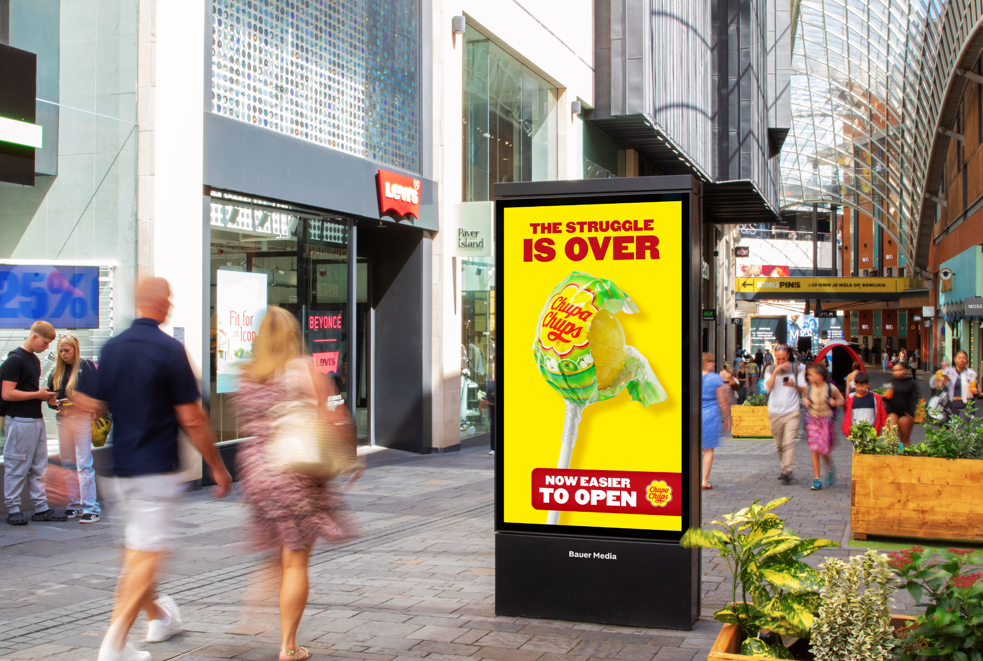 FMCG brand Chupa Chups easy to open campaign out of home ad on a highstreet