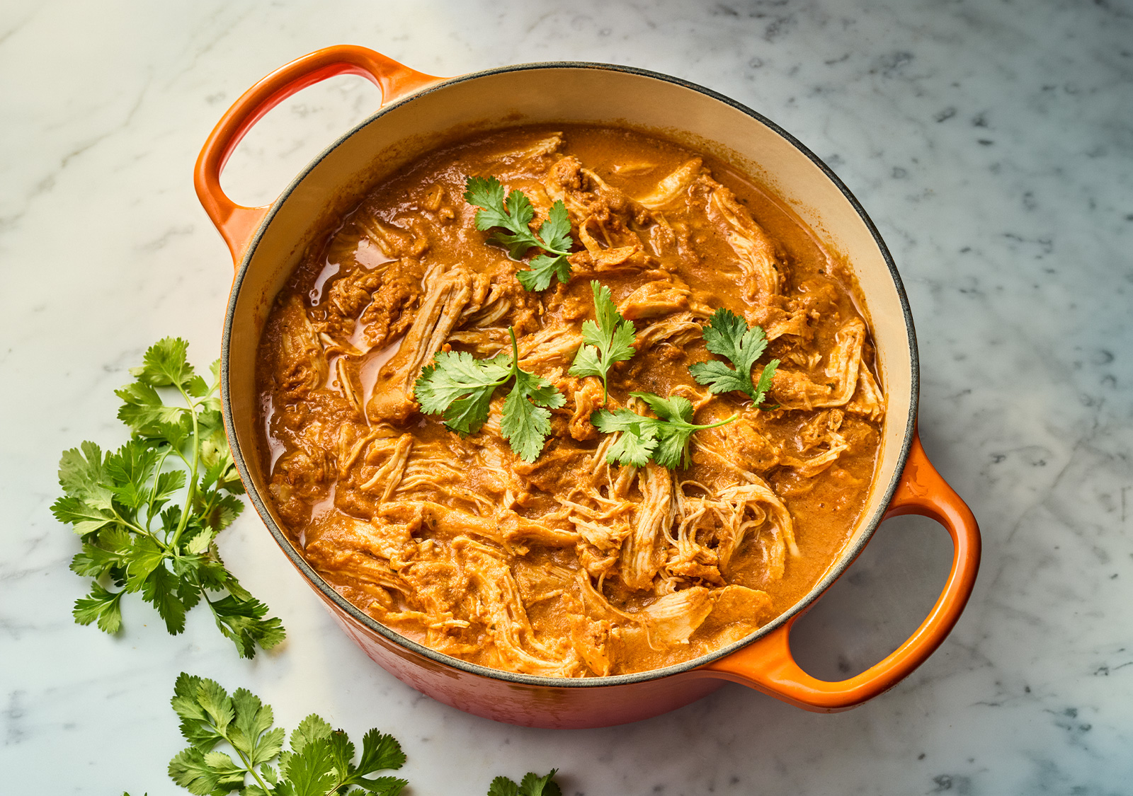 Shredded Chicken Tinga in a dutch oven pot
