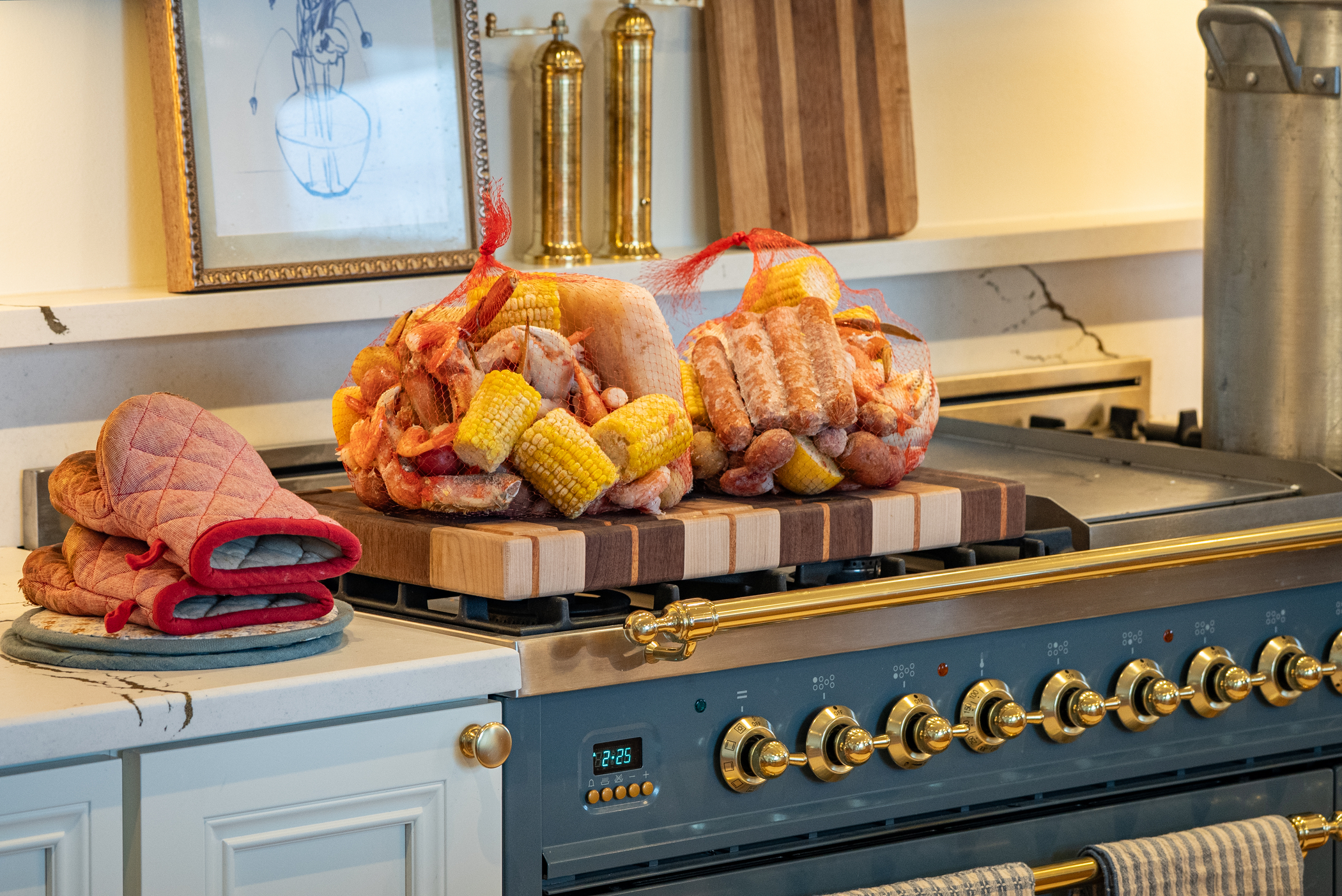 Featuring Dungeness Crab, Easy-Peel Shrimp, Scallops, and Locally Made Stick Leg Ranch Andouille Sausage.